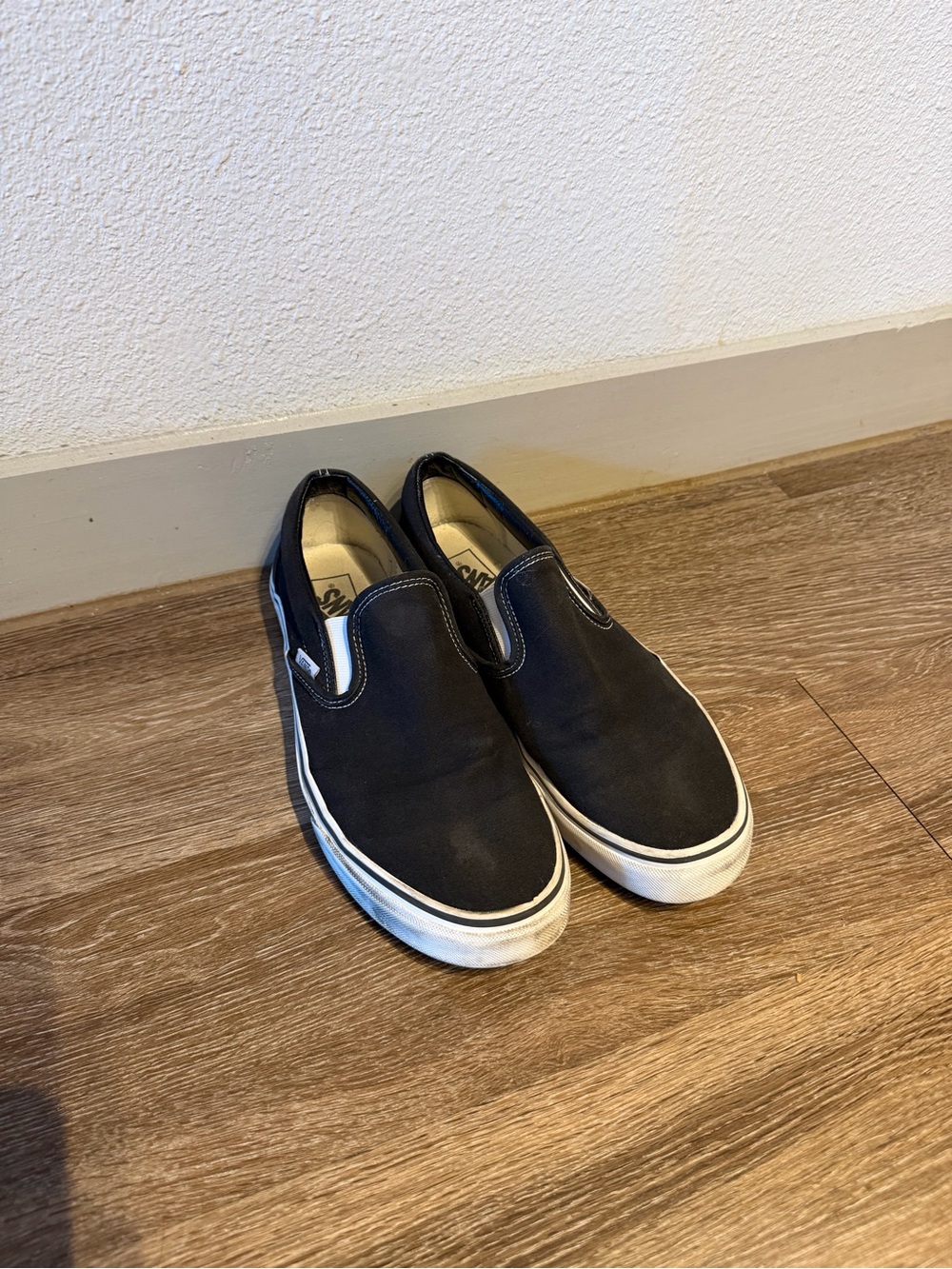 Vans Black Slip-On Canvas Sneakers with White Sole